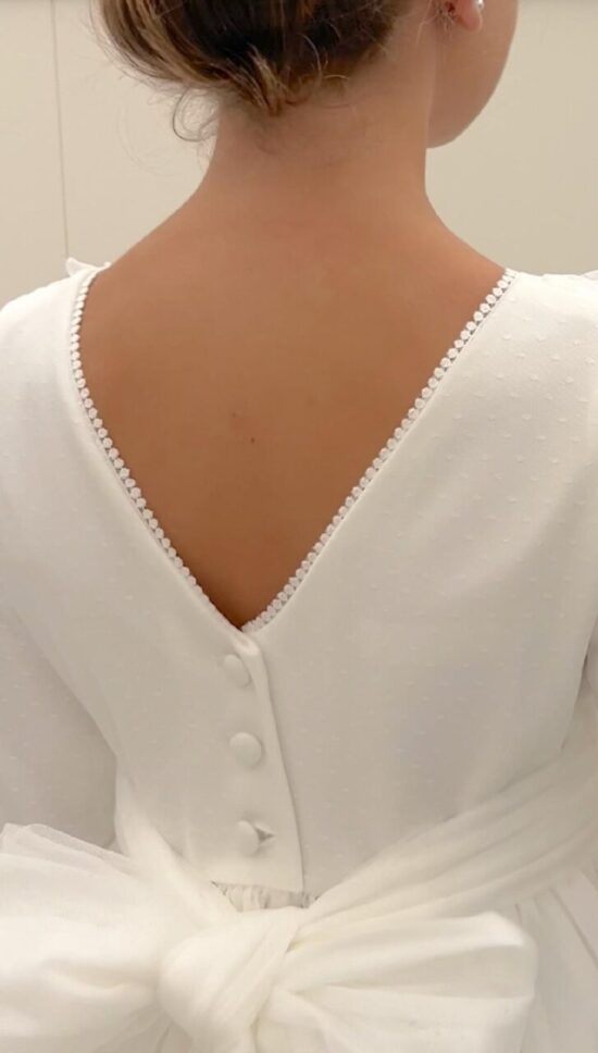 LOURDES ESPALDA CERCA